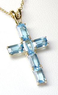 
Elegant Blue Topaz Baguette Cross
