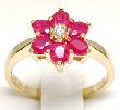 
Oval Ruby & Diamond Flower Ring
