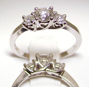 
Three Stone Diamond Engagement Ring
