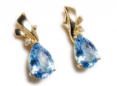 
Bold Pear Topaz and Diamond Earrings
