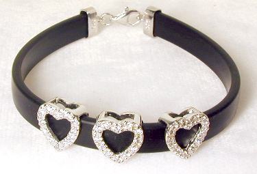 
CZ Triple Heart Black Rubber Bracelet
