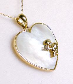 
Simulated Mother of Pearl and Diamond Heart Angel Pendant
