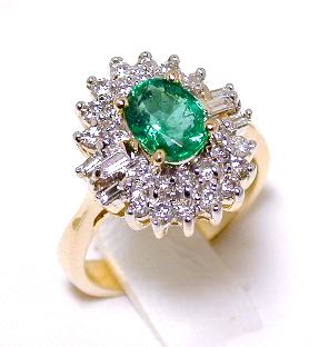 
Round & Baguette Diamond & Emerald Ring

