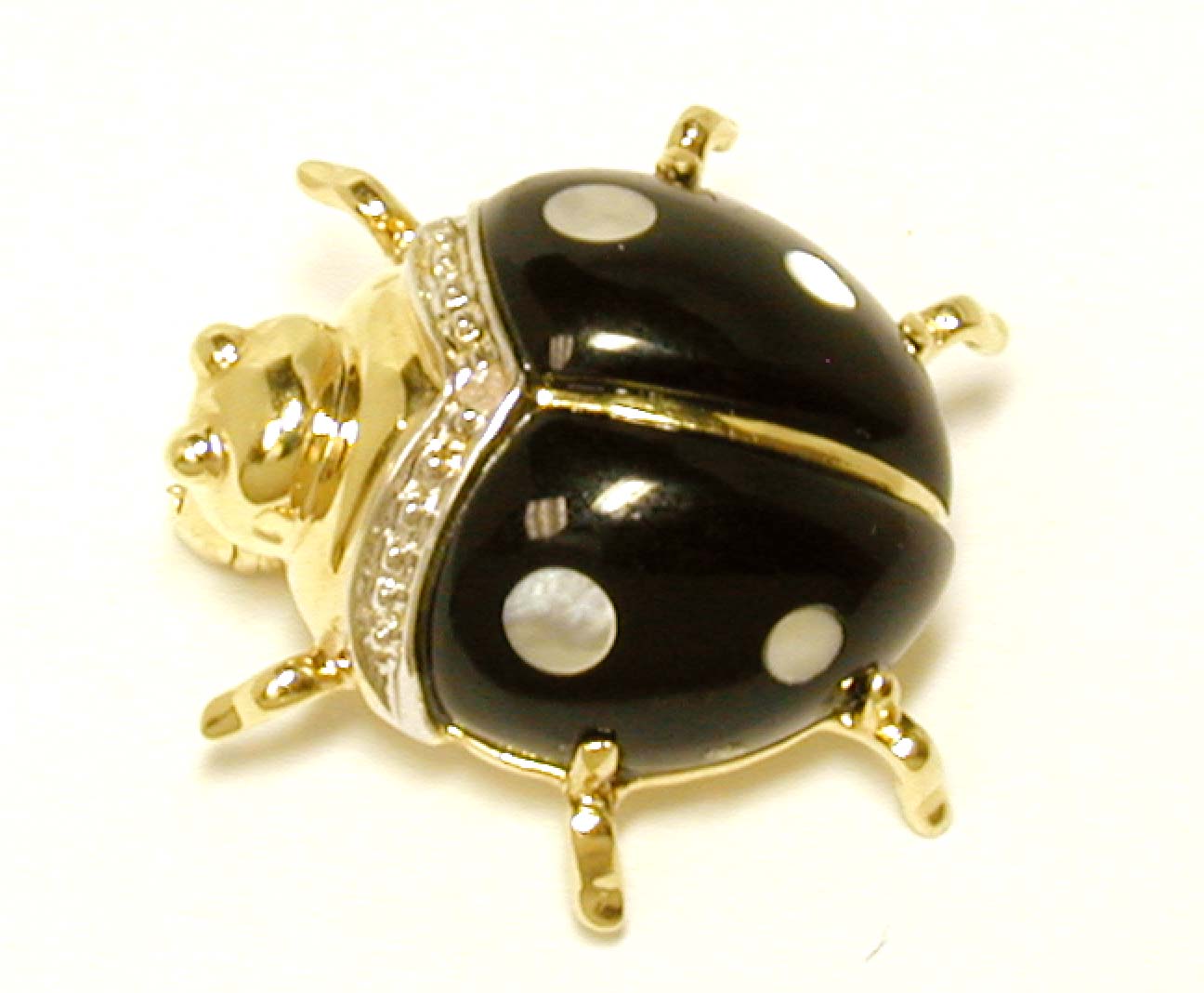 
Simulated Onyx/ Simulated Mother of Pearl and Diamond Bug Pin
