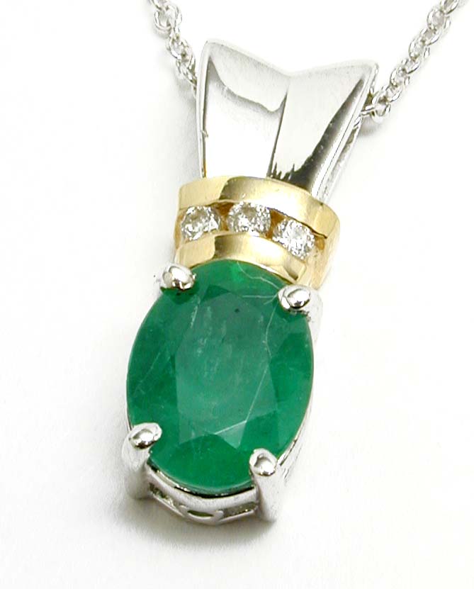 
Elegant Two-tone 8x6mm Oval Emerald and Diamond Pendant

