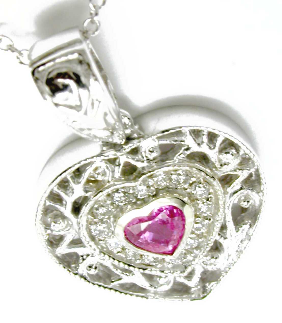 
Intricate Heart-shaped Pink Sapphire and Diamond Pendant
