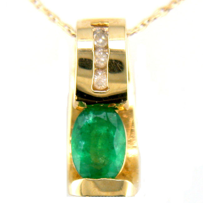 
10k Yellow 5x3 mm Oval Emerald and Diamond Pendant
