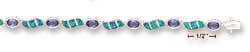
Sterling Silver 7I Alt Simulated Tanzanite Syn. Blue Simulated Opal Swoosh Bracelet
