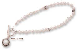 
Sterling Silver 7 Inch Simulated Mother of Pearl Beads with Beads Toggle Bracelet
