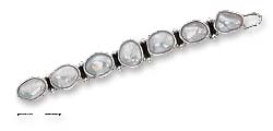 
Sterling Silver Natural Shape Multi Freshwater Cultured Pearl Hair Clip With Snap Closure
